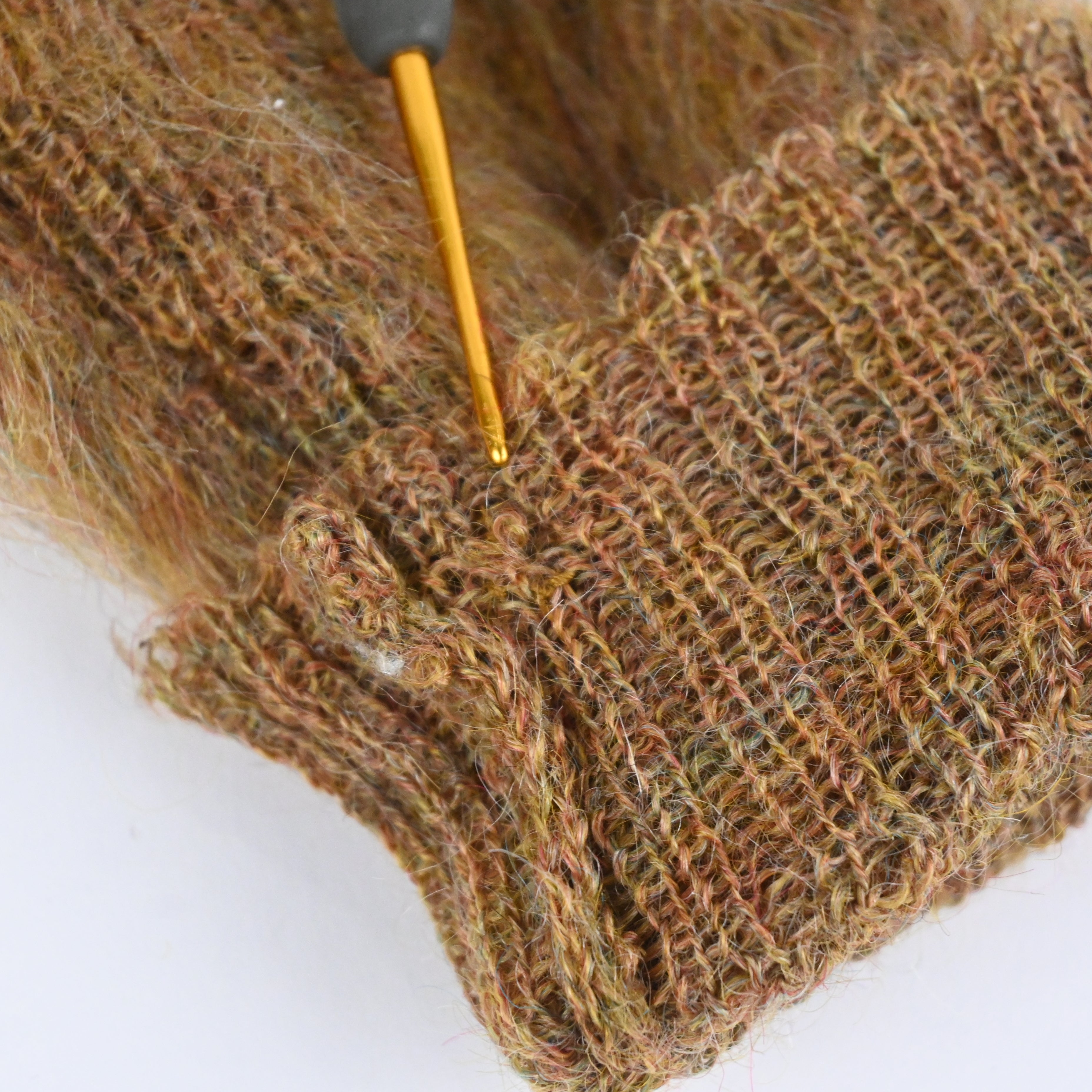 右袖口裏にリペアがございます。(裏)